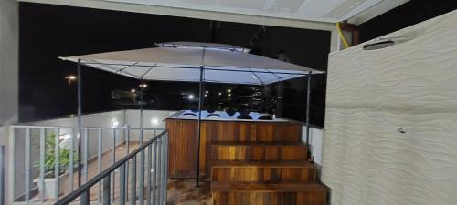 Praia das Palmeiras House | Suíte Praia na casa da Berenice