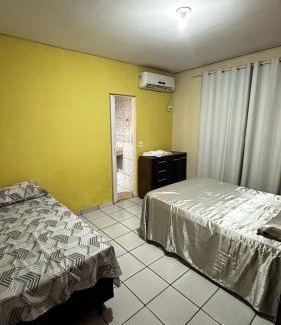 Plano Diretor Sul House | Suíte privativa com cozinha completa, ar e Wi-Fi