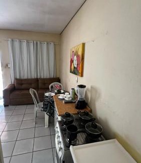 Plano Diretor Sul House | Suíte privativa com cozinha completa, ar e Wi-Fi