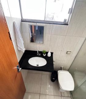 Plano Diretor Sul House | Suíte privativa no centro da capital em casa compartilhada