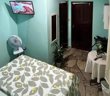 Bandeirantes House | Suíte Verde