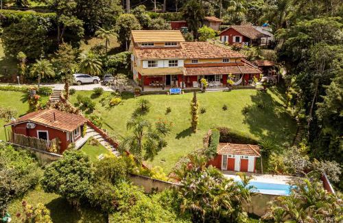 Nogueira House | Su Paradise Villa Chalés e Suítes