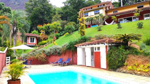 Nogueira House | Su Paradise Villa Chalés e Suítes