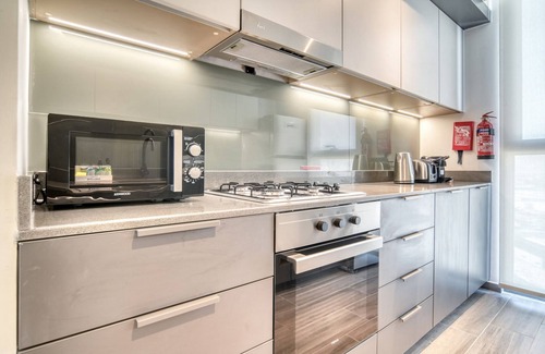 Dubai Production City Apartment | Suave 2BR w/Assistant’s Room at Mesk 1 Midtown Dubai Production City by Deluxe Holiday Homes