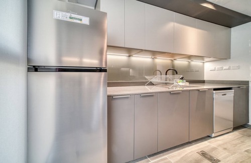 Dubai Production City Apartment | Suave 2BR w/Assistant’s Room at Mesk 1 Midtown Dubai Production City by Deluxe Holiday Homes