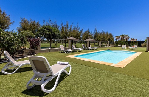 Caleta de Fuste Villa | Substantial Villa for 6/8 people with outdoor covered terrace, pool and gardens