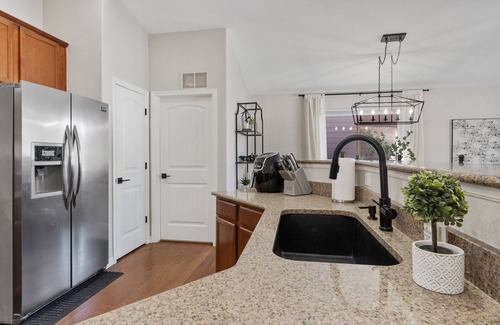 Loveland House | Suburban Dream Home with Hot Tub
