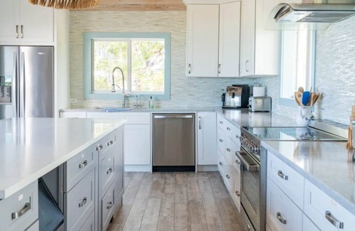 William's Town Villa | Sugar Beach Villa, - sprawling estate with hot tub, pool, and private cottages