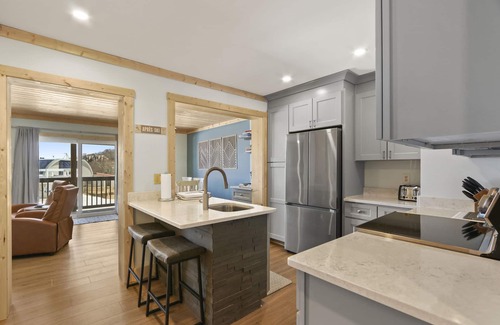 Sugar Mountain Condo | Sugar Ski Ski-In Ski-Out. 2 Bedroom. Pool+Hot tub. 150 feet from slope and pool.