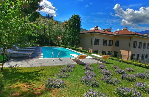 Riva Apartment | Suite "Barbo" at 2 steps from the lake - Resort with lounge bar, swimming pool and beach