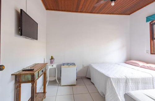 Centro Comercial House | Suite Ilhabela passos da praia