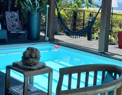 Grand Bois House | Suite INDIGO JACUZZI PRIVE PISCINE VUE MER acces cuisine laverie