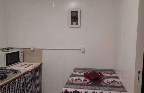 Cidade Nova Apartment | suite+kitchen twelve with air conditioning