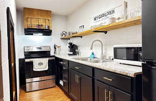 Blair Heights Apartment | "SUITE LINDA" walk-out suite in a park setting