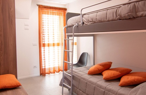 Cagnona Condo | Suite Malvasia suite in a new private building near the sea and the center.