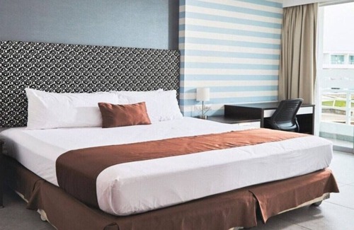 Asia Hotel | Suite Matrimonial King and living Room at VPX Hotel