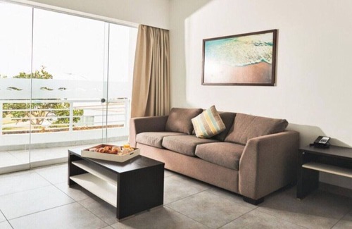 Asia Hotel | Suite Matrimonial King and living Room at VPX Hotel