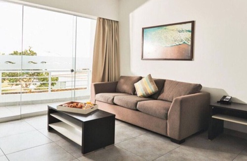 Asia Hotel | Suite Matrimonial King and living Room at VPX Hotel
