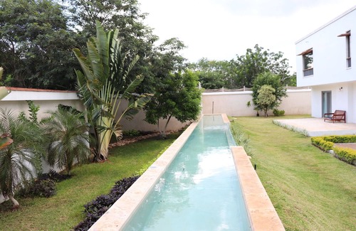 Merida Municipality House | SUITE NEAR DZIBILCHALTUN & TENNIS COURT