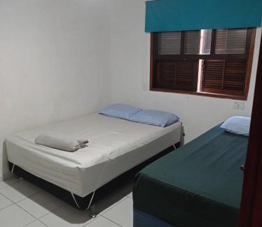 Centro Comercial Apartment | Suite passos da praia em Ilhabela
