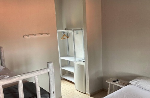 Garopaba House | Suite Térrea Premium - Pousada Buena Onda - SC