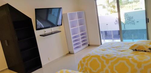 Villa de Alvarez Hotel | Suites Lagunas
