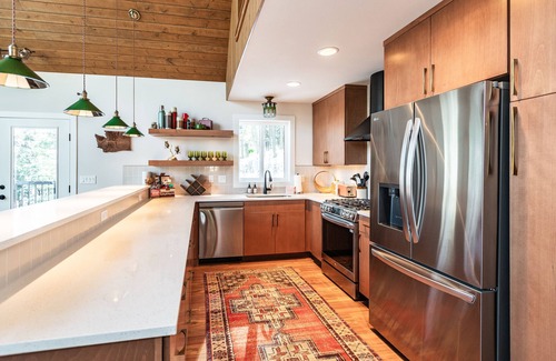 Cle Elum Ski Chalet | Summer camp is here at Cle Elum Cabin! Featuring a private hot tub, shuffleboard, games galore, fully stocked kitchen and much more!