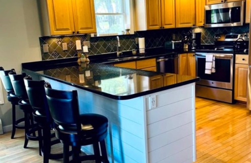 Barnstead House | Summer fun! Gameroom, kayaks, paddleboards, fire pit, screen porch, decks