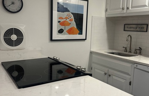 Harwich Port Cottage | Summer gem located steps from Saquatucket Harbor + Nantucket sound.