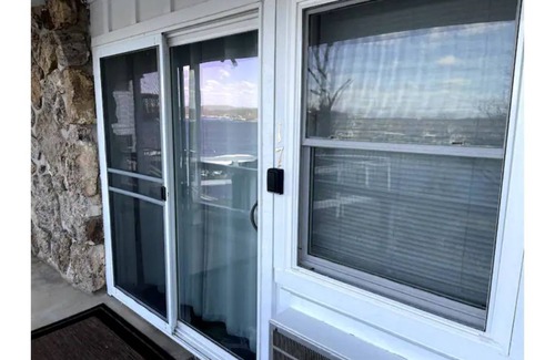 Lake Ozark Condo | Summer is calling! Enjoy this 1b/1b lakeside condo with amazing views!