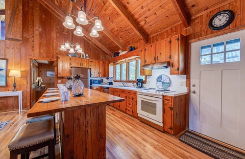 Brigands' Bay House | SUMMER SAVINGS - Canalfront Home with Hot Tub, Private Boat Dock, and Smart TVs