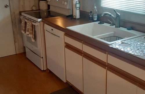 Taylor Creek House | Summer Special 60 off! 3 bed, 2 bath on water, boat house, pontoon available