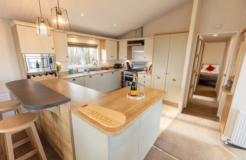 Swarland Cottage | Sun Catcher - a lodge that sleeps 4 guests in 2 bedrooms