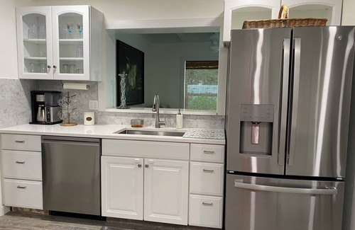 Central Beach House | Sun drenched 3-bedroom house in central Vero Beach with new pool/hot tub