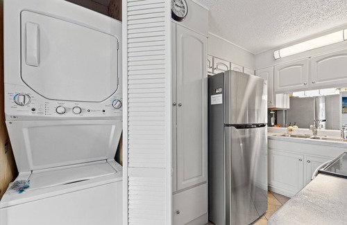 Thomas Drive Condo | Sun-Kissed Bliss Skip Elevators 2nd Floor Beachfront + Free Chairs & Tikki