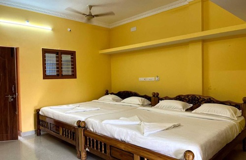Bommayapalayam Hotel | “Sun, Sand, and Comfort: Dream Promenade Sea View”