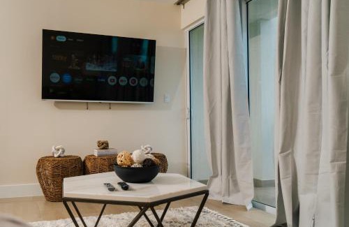Little Battaleys Apartment | Sun-Sand-Serenity! Steps from the Beach, Luxe Pool & Cozy Comfort for 4