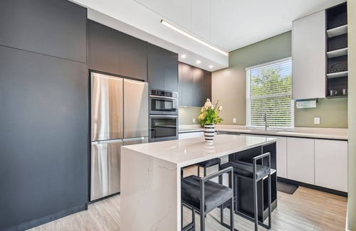 Historic Old Northeast Apartment | Sun Soaked Designer Condo with Patio