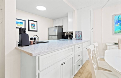 Port Canaveral Condo | Sun-Soaked Ground Floor Corner Condo – W/BBQ Grills, Heated Pool & Steps to the Pier! ☀️