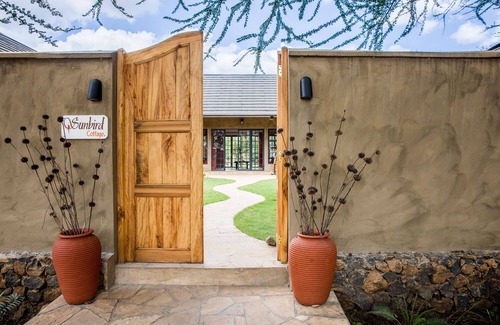 Arusha Cottage | Sunbird Cottage, Exclusive Cottage located on 18 hole Golf course, Tanzannia