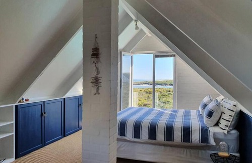 Grotto Bay House | Sunbird House