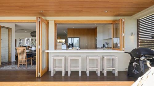 Emerald Beach House | Sundecks - Walk to Beach and Cafes, Accessible, Family Friendly