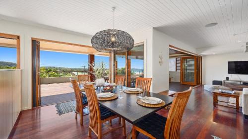 Emerald Beach House | Sundecks - Walk to Beach and Cafes, Accessible, Family Friendly