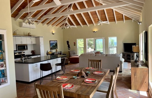 Estate Concordia East House | Sunflower - Amazing view of the Caribbean Sea, pool & lush tropical landscaping