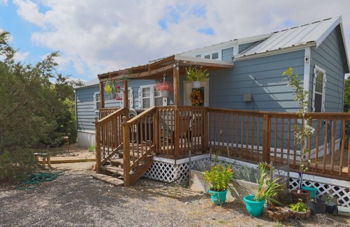 Paluxy Cabin | Sunflower - Hot Tub on porch - City Escapes Cabins