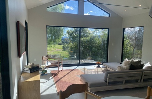 Ojai House | Sunlight filled retreat on acres of organic orchards with mountain views.