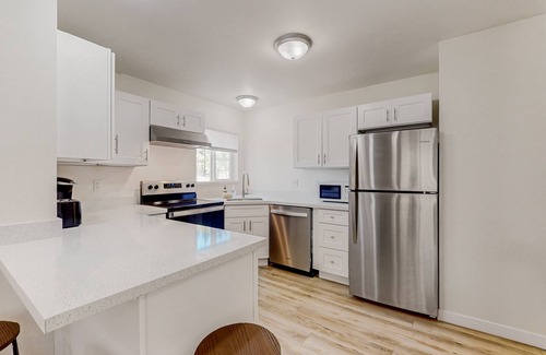 Olympia Apartment | Sunlit getaway with a deck, washer/dryer, & full kitchen