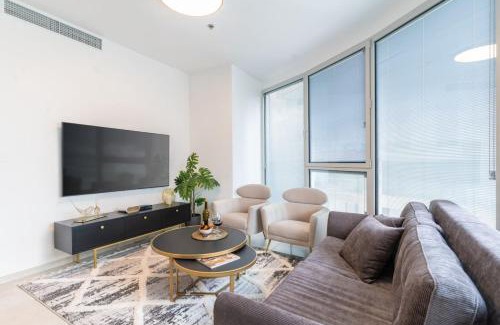 Tel Aviv Apartment | Sunlit Urban Escape with Balcony with Mamad by Sea N' Rent