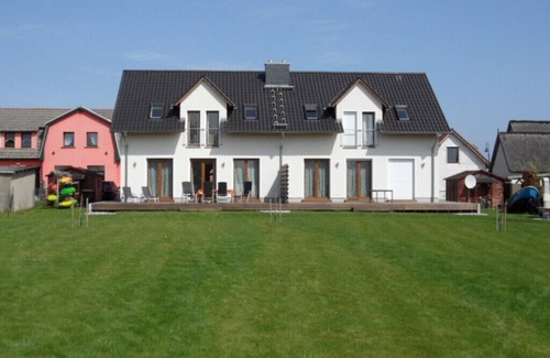 Kamminke House | SÜNN & BRIES directly on the beach: large house with fenced garden+kayaks+DSL