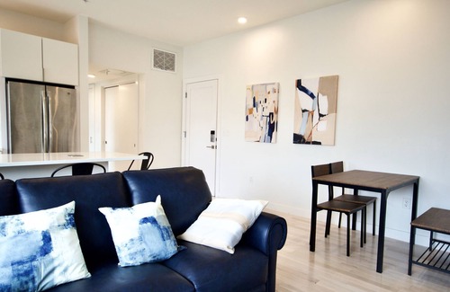 Wayland Apartment | Sunny 2-Bedroom Cityscape located in Highly Regarded East Side Square